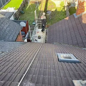 a view of a roof with a skylight on top of it