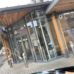 a car is parked in front of a building